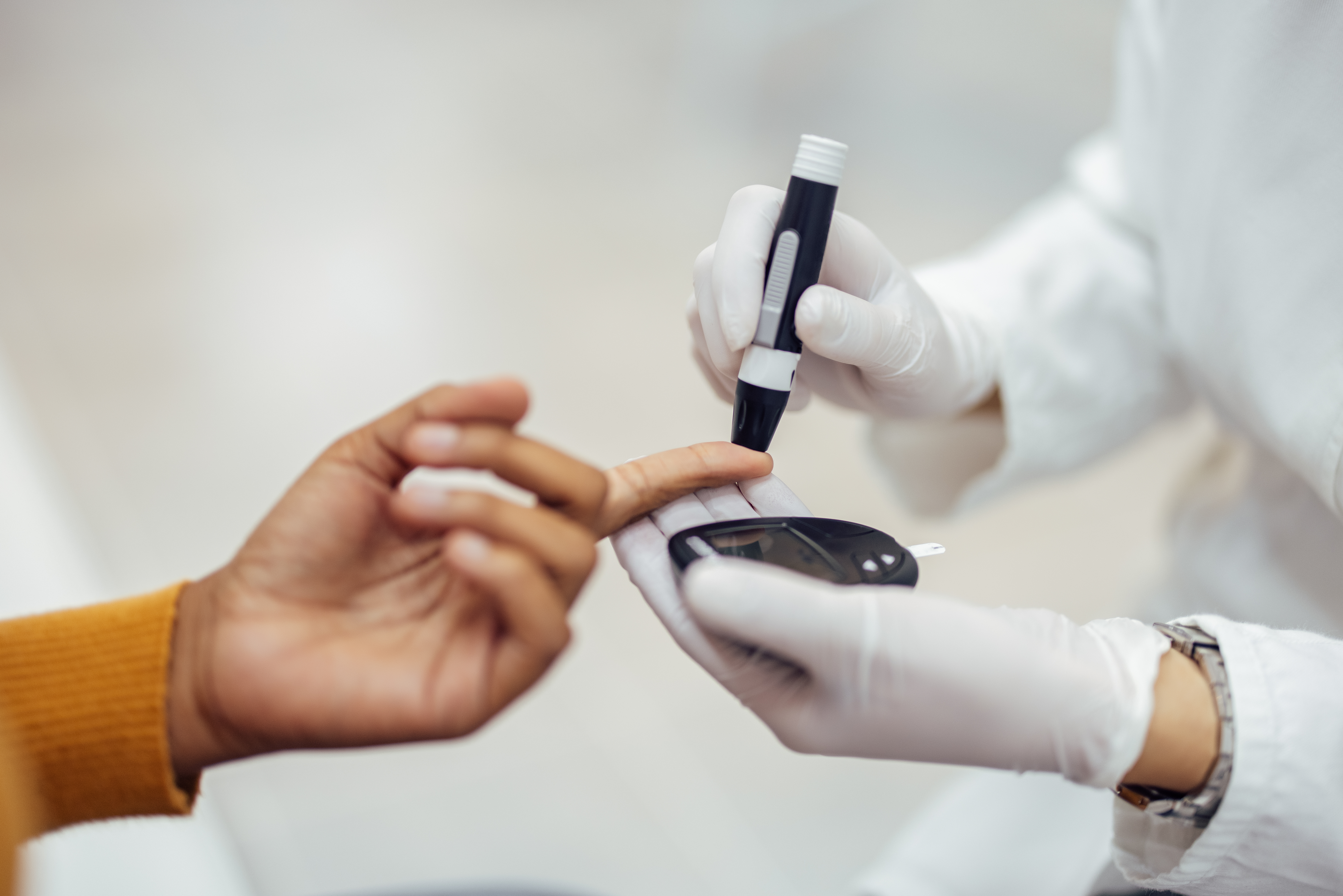 Nurse measuring blood pressure of a patient